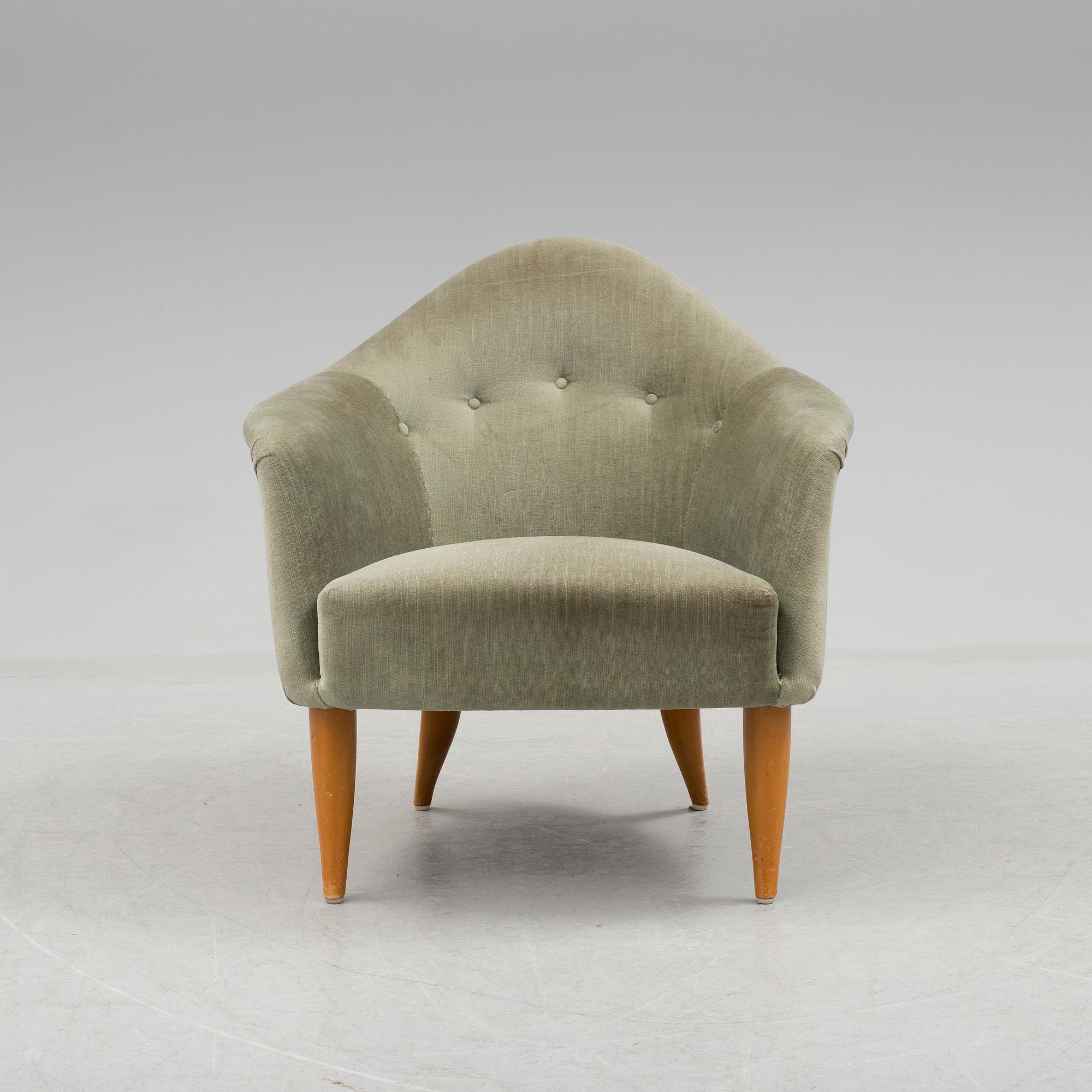 A easy chair "Lilla Adam" by Kerstin Hörlin-Holmquist.