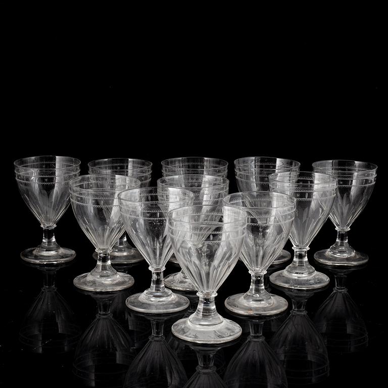 A mixed lot of nineteen 19th century Empire wine- and champagne glasses.