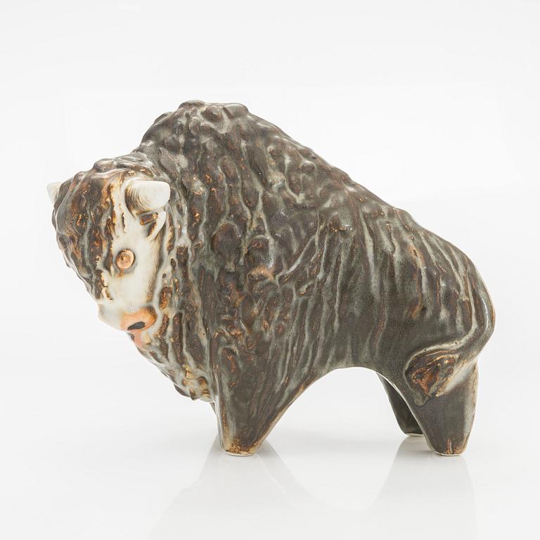 Taisto Kaasinen, A stoneware figurine, signed TK Arabia, 1960s-70s.