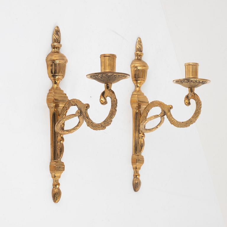 A pair of 'Törne' brass one-light wall ligths from IKEA's 18th Century collection.