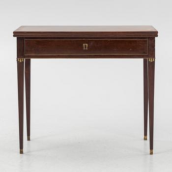 A late Gustavian mahogany games table, Stockholm, late 18th century.