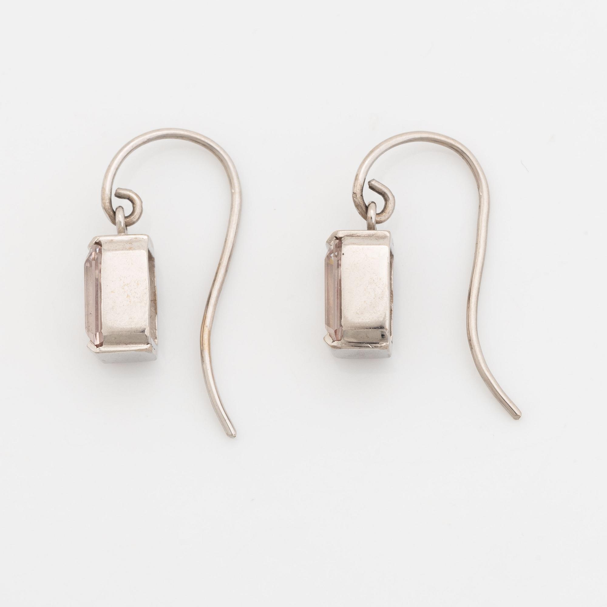 White gold and emerald cut morganite earrings.