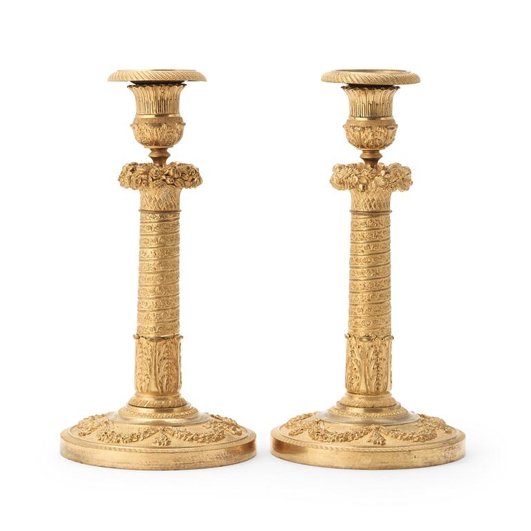 A pair of Empire candlesticks.