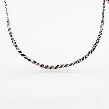 A sterling silver necklace "Twined jewellery from Lampola in Halikko". Kalevala koru, Helsinki 1992.