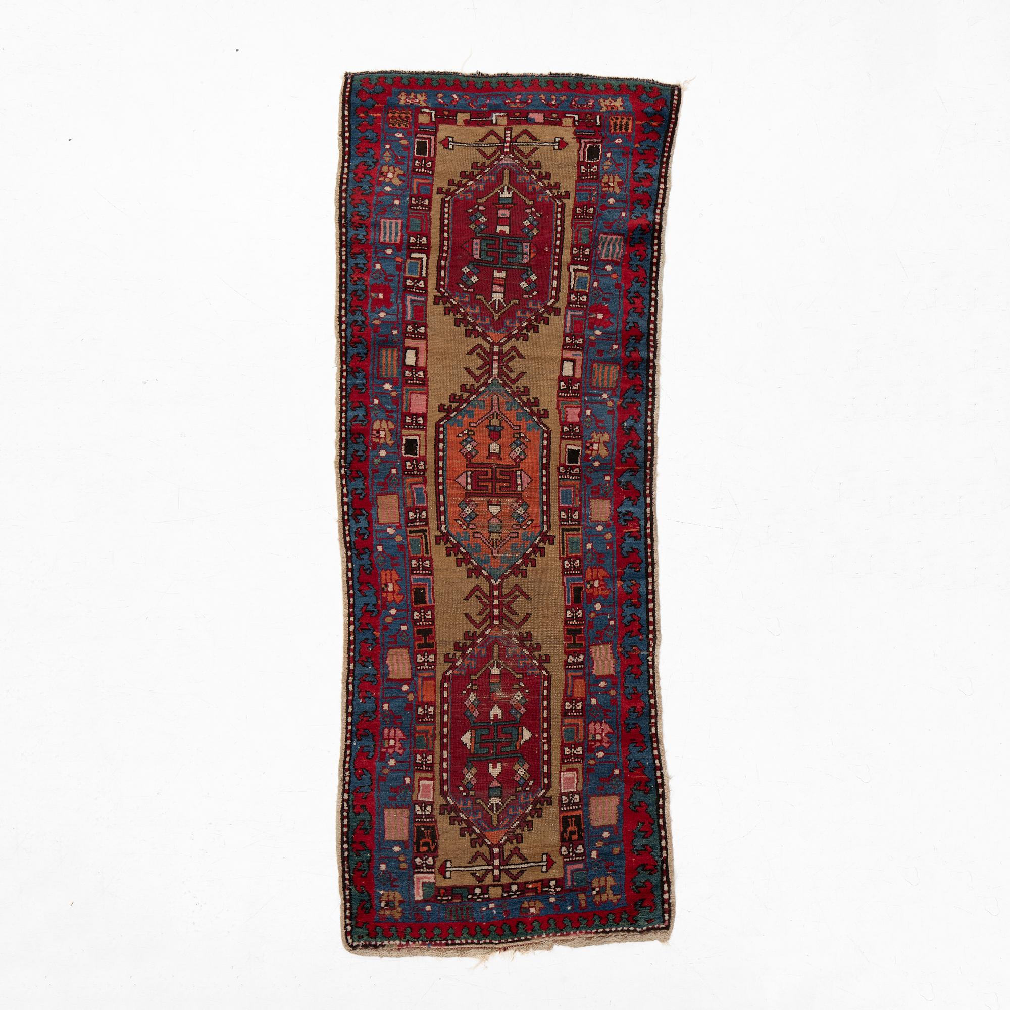 An antique Northwest Persian runner, c. 257 x 99 cm.