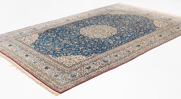 A semi-antique Nain Tusheshk, signed, ca 324 x 223 cm.