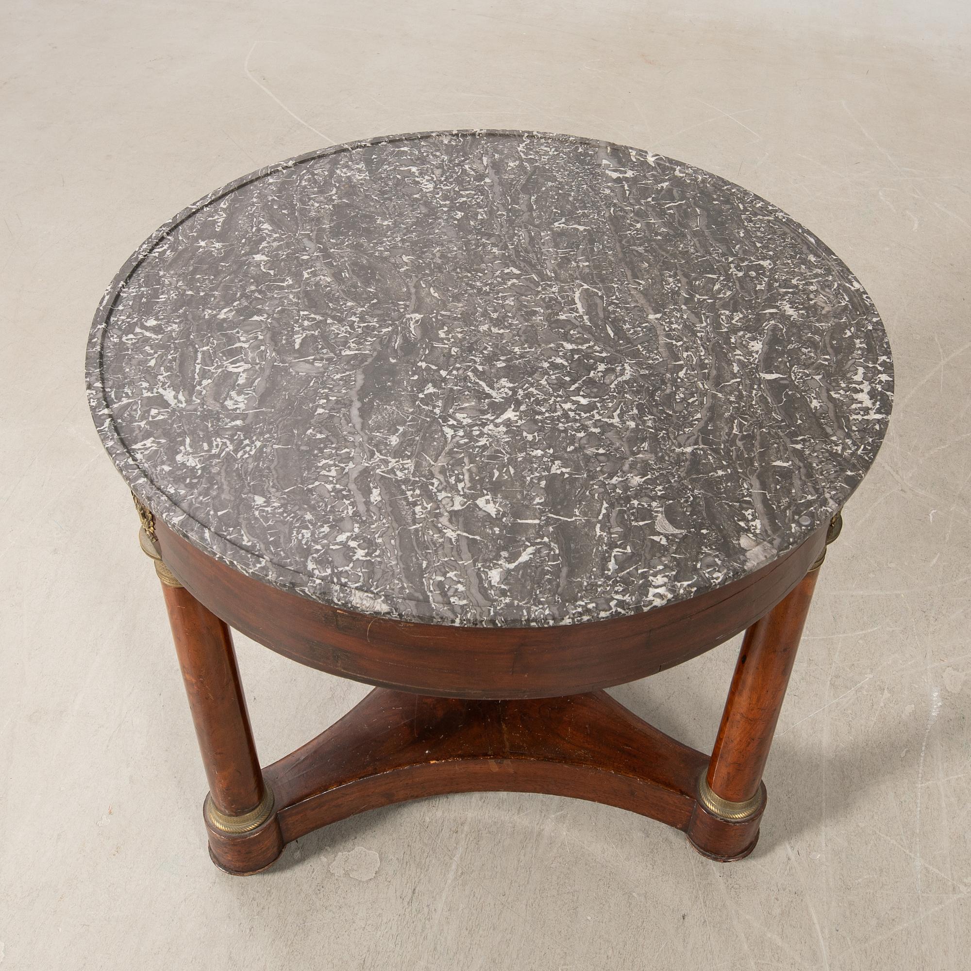 Salon table in the Empire style, circa 1900.