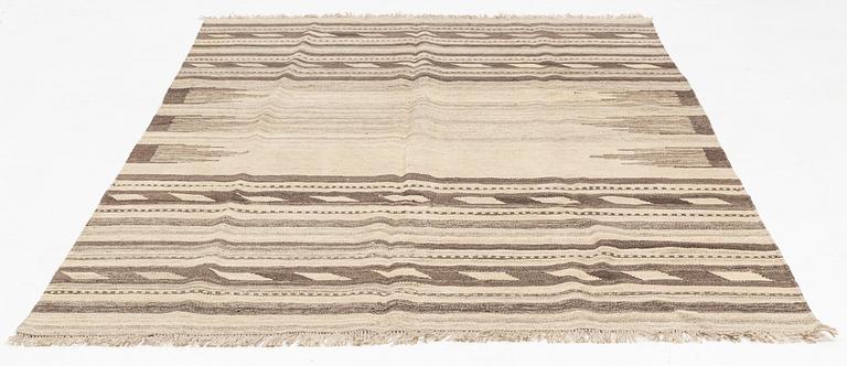 A kilim rug, ca 295 x 196.