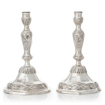 A matched pair of 18th century silver candlesticks, mark of Isak Trybom, Stockholm 1775 and.