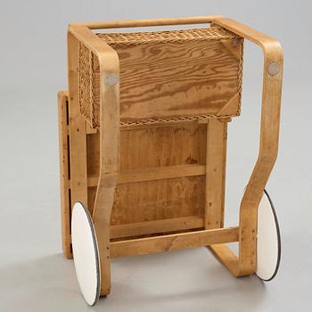Alvar Aalto, a birch serving trolley made by Aalto Design, Hedemora Sweden 1945-56, on license on behalf of Artek, Finland.