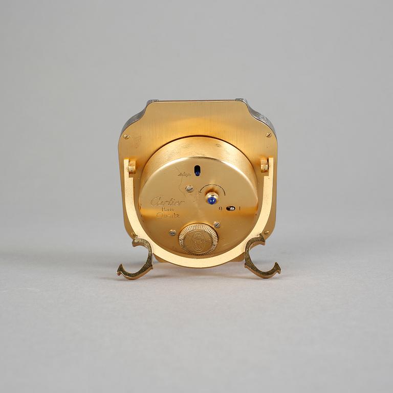 VÄCKARKLOCKA, guld och stål, Cartier.