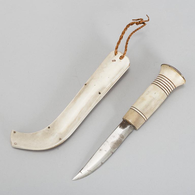 ESSE POGGATS, a Sami reindeer horn knife, signed EP.