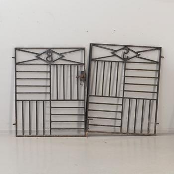 A pair of cast iron gates from the first half of the 20th Century.