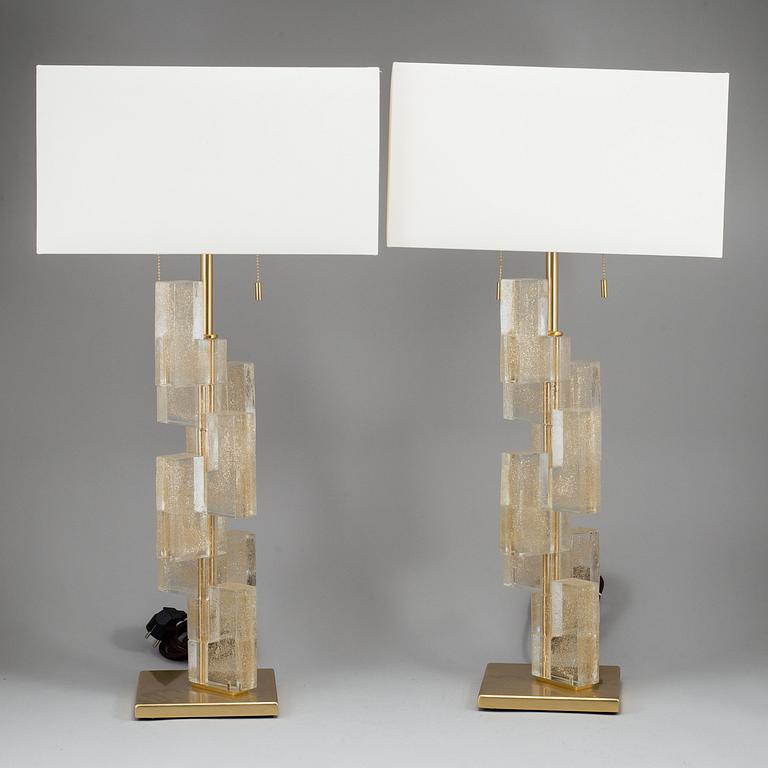 A 'Esha Alta' glass and brass table lamp from Donghia lightning.