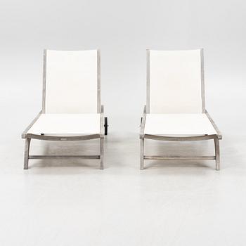 A pair of 'Columbus Sunbed' teak deck chairs, Skagerak, Denmark.