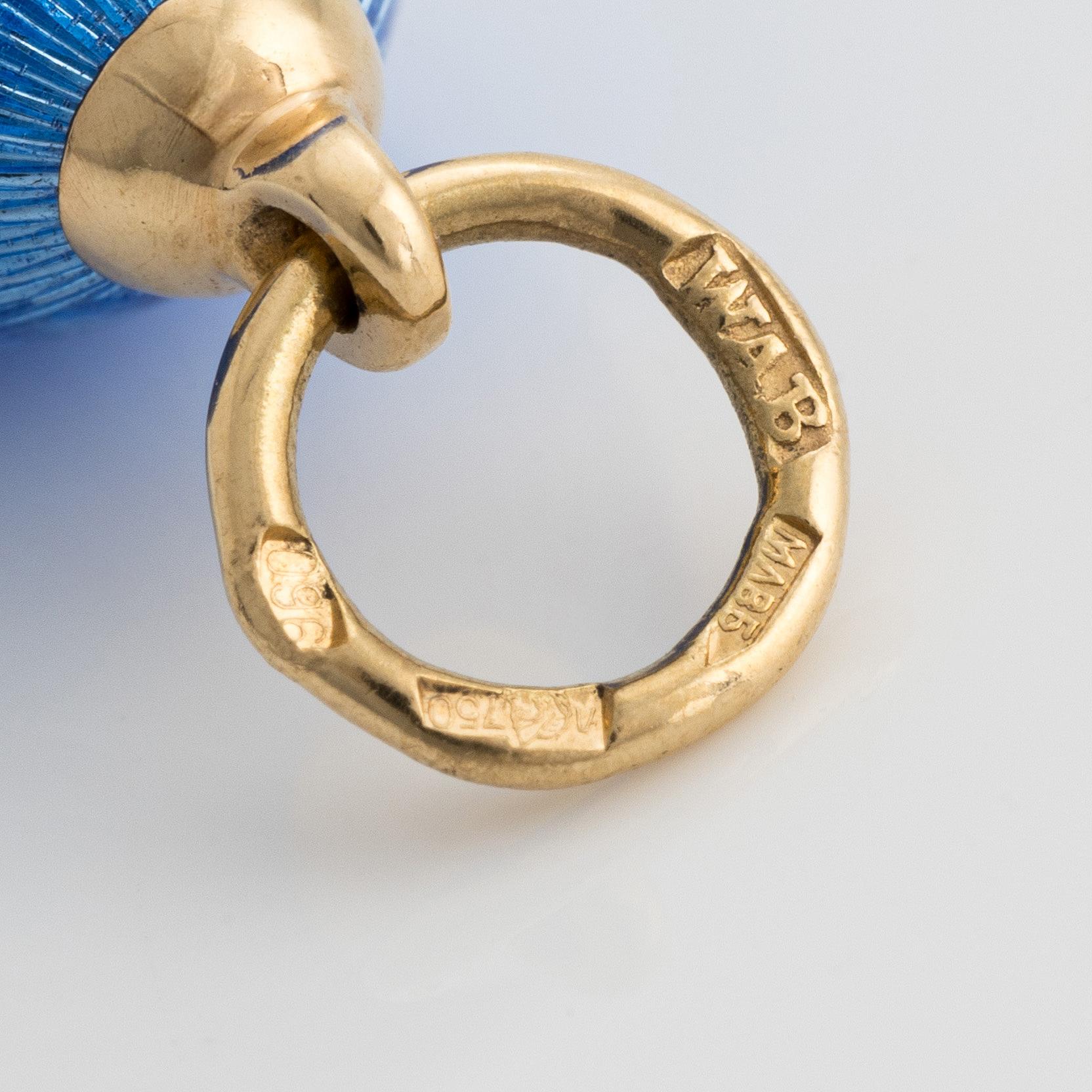 W.A Bolin, jeweled egg with blue and black enamel and a band of brilliant-cut diamonds.