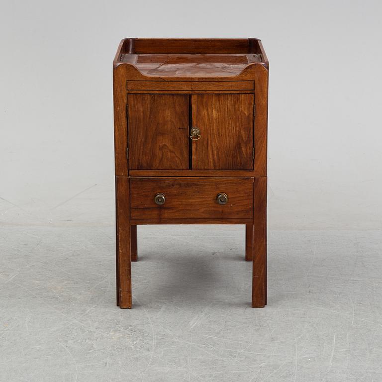 A mahogany bedside table, England, 19th century.