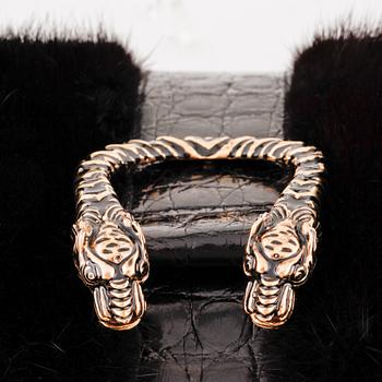 GUCCI, a black fur and crocodile shoulder bag.