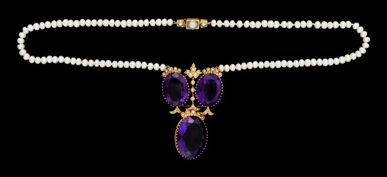 A gold and three stone amethyst and pearl 19th cent. pendant. Freshwater pearl necklace.