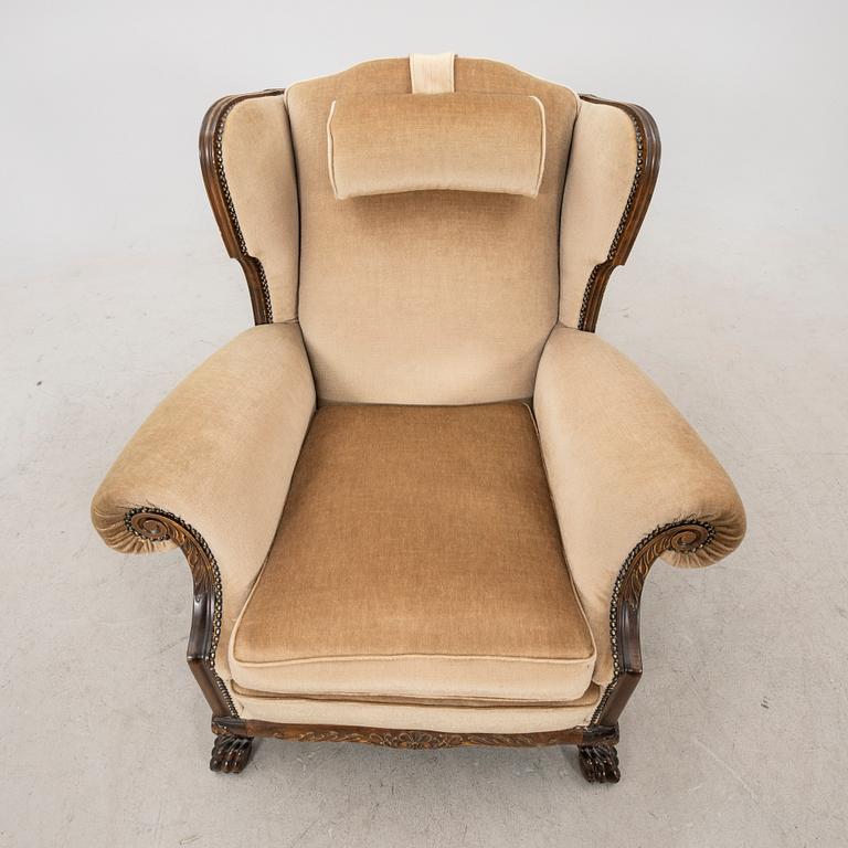 A fabric upholstered easy chair from the second half of the 20th Century.