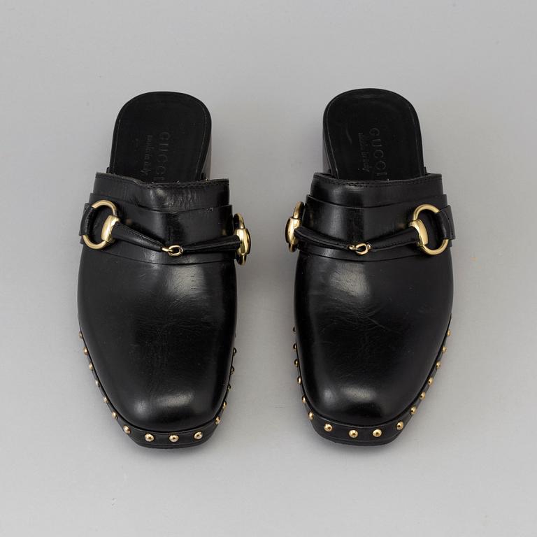 CLOGS by Gucci, size 40.