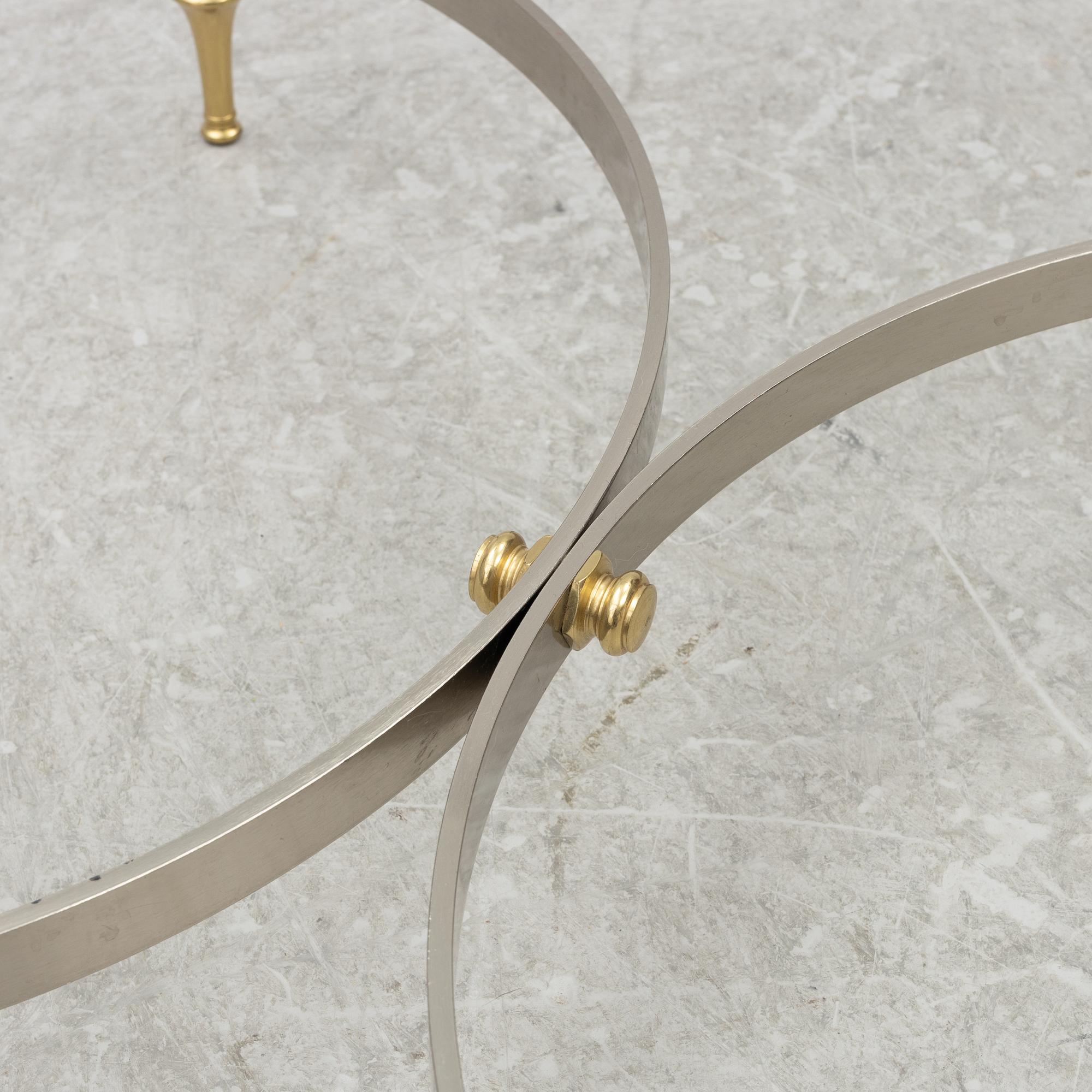 A pair of brass and glass sidetables, mid20th/second half of the 20th century.