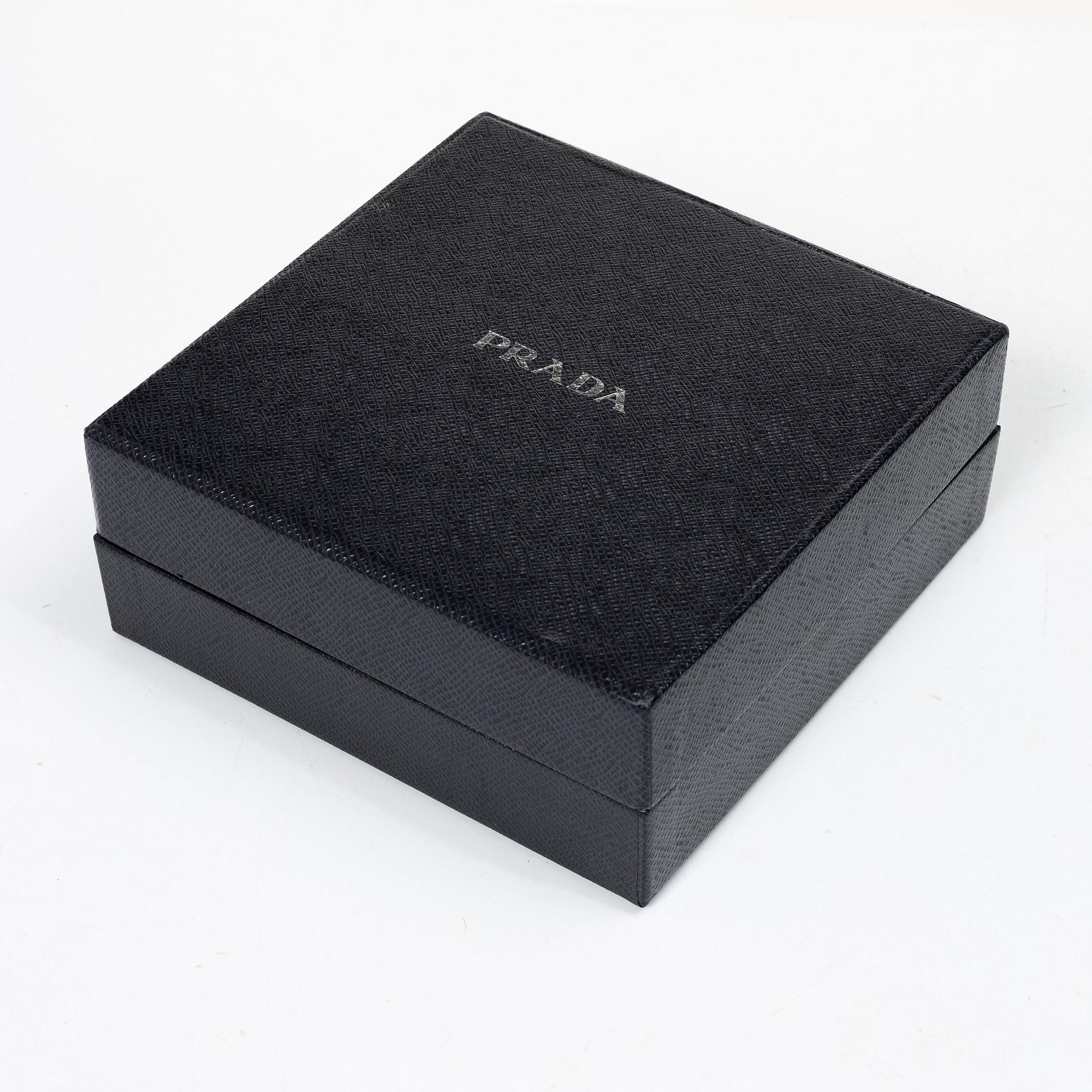 Prada, A black silk hairband.