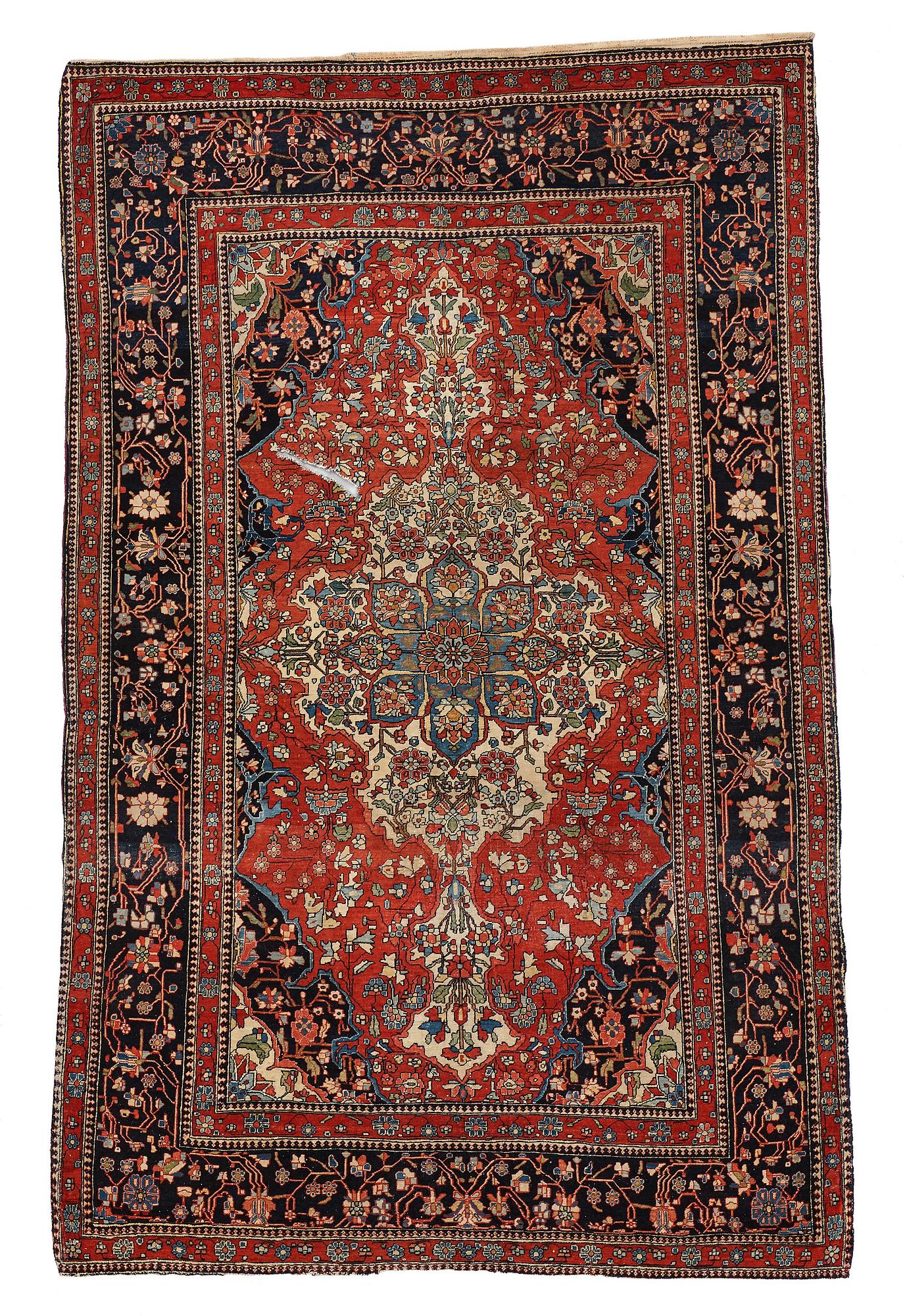 A RUG, a semi-antique Kashan Motachem, ca 217,5 x 134 cm.