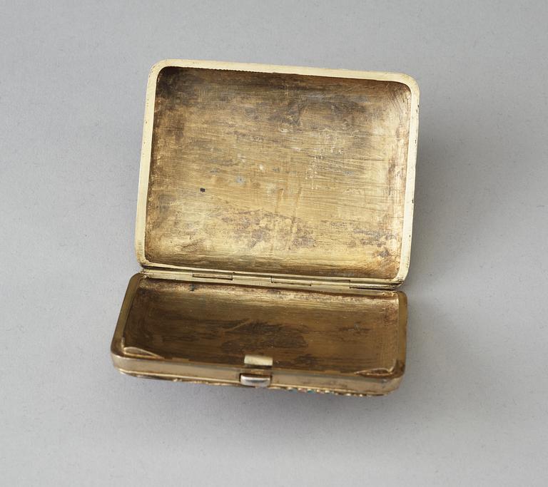 A Russian silver-gilt and enamel cigarette-case, makers mark of Nikolaj Swerew, Moscow 1896-1908.