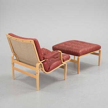 BRUNO MATHSSON, "Ingrid", fåtölj och fotpall, DUX design, 1969.