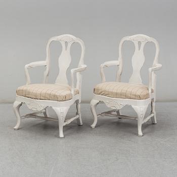 A pair of Swedish Rococo-style armchairs, second half of the 20th century.