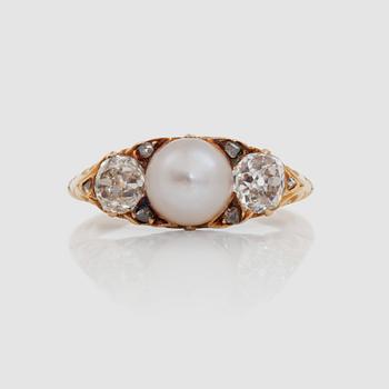 1219. An old- and rose-cut diamond and natural saltwater pearl ring.