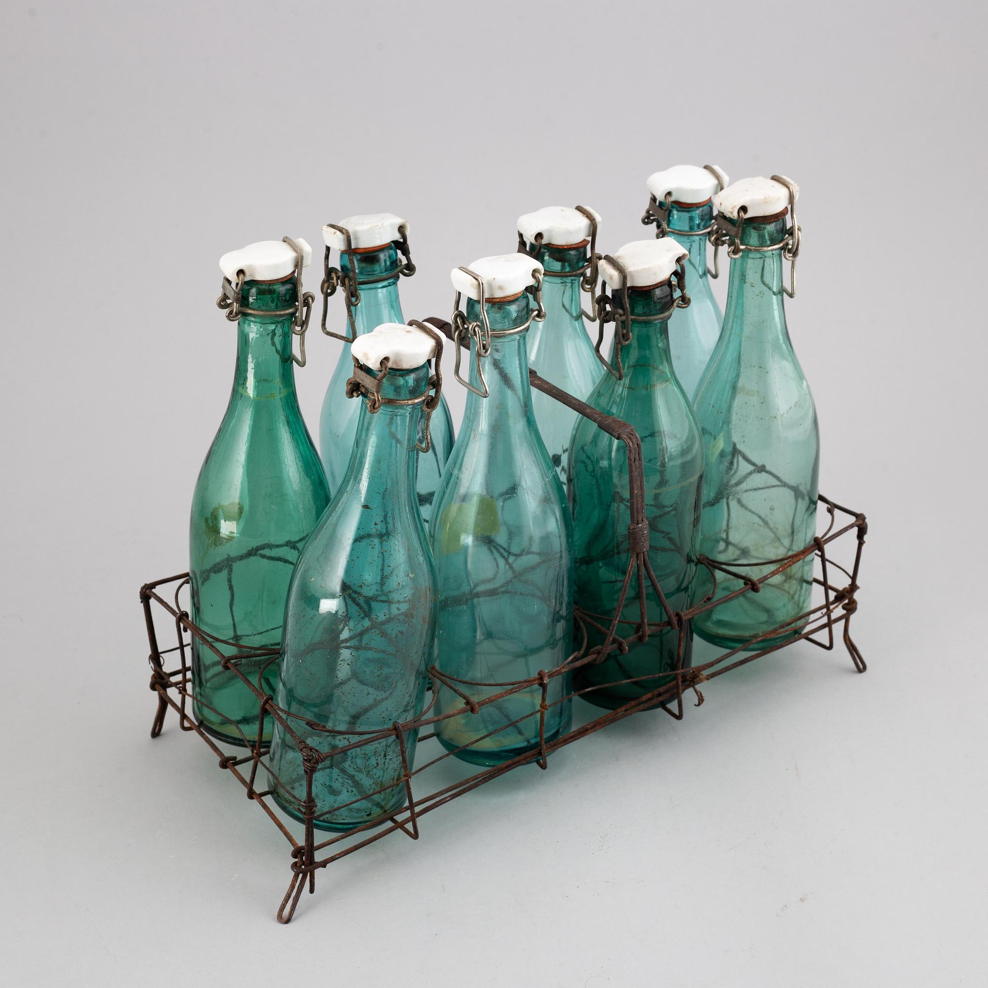 A metal bottle holder, first half of the 20th century.
