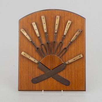 Six forks and two knives, 19th Century.
