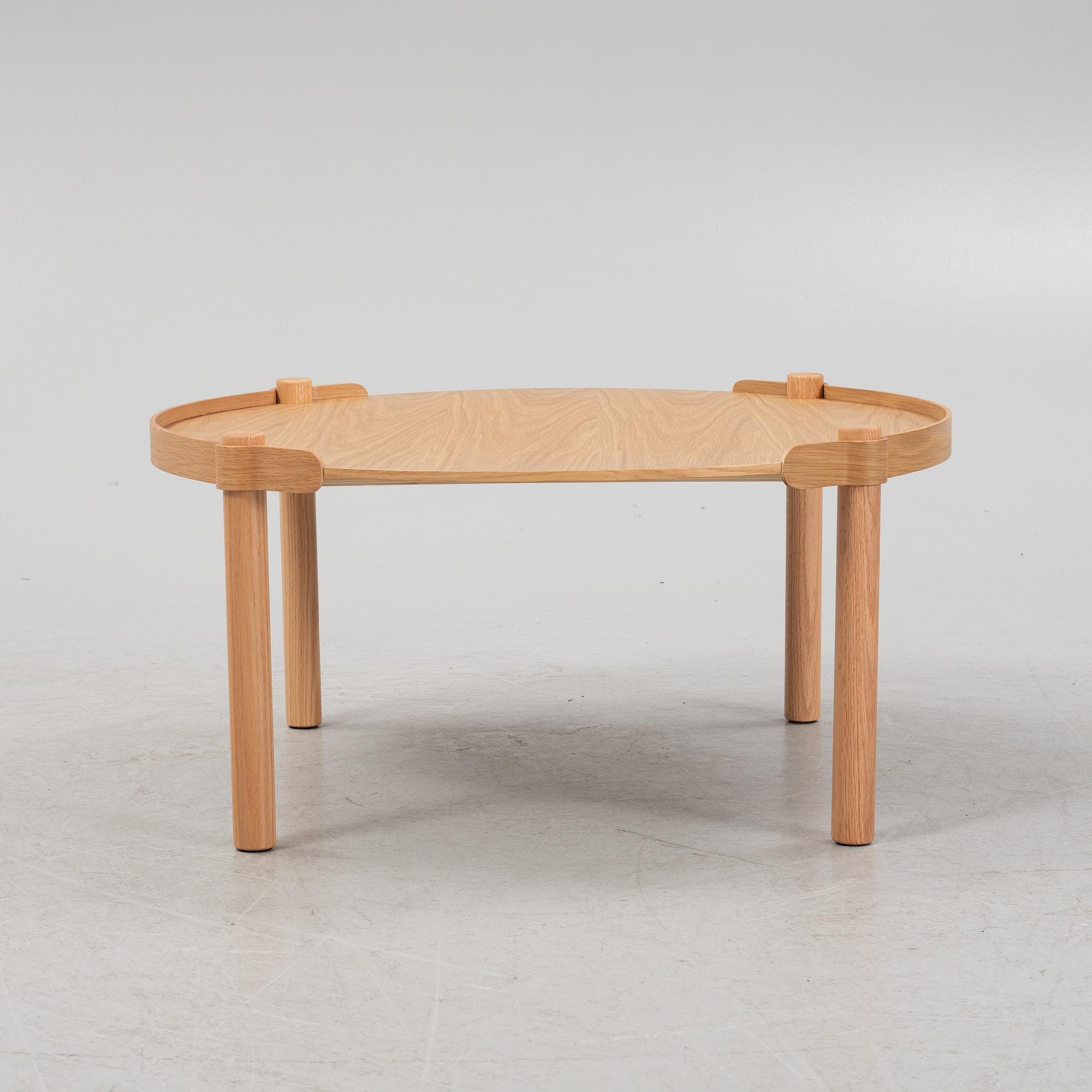A 'Woody' oak veneered coffee table from Cooee design.