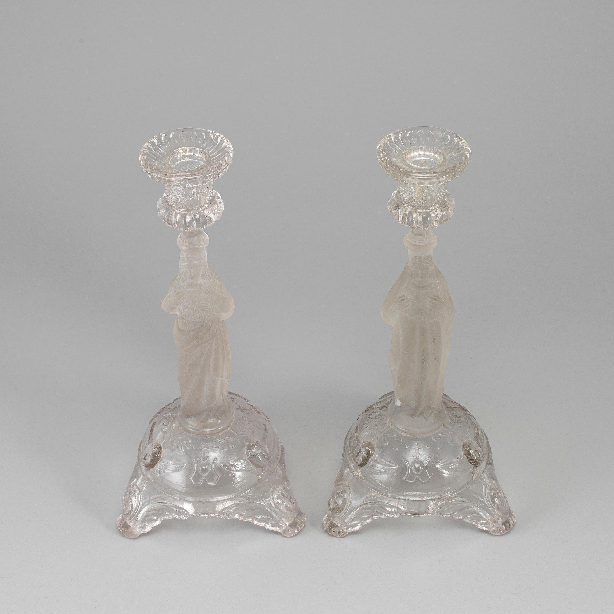 A pair of moulded glass candlesticks, late 19th century.