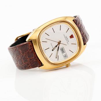 ARMBANDSUR, guld på stål, Omega, Megaquartz 32 KHz, Genève.