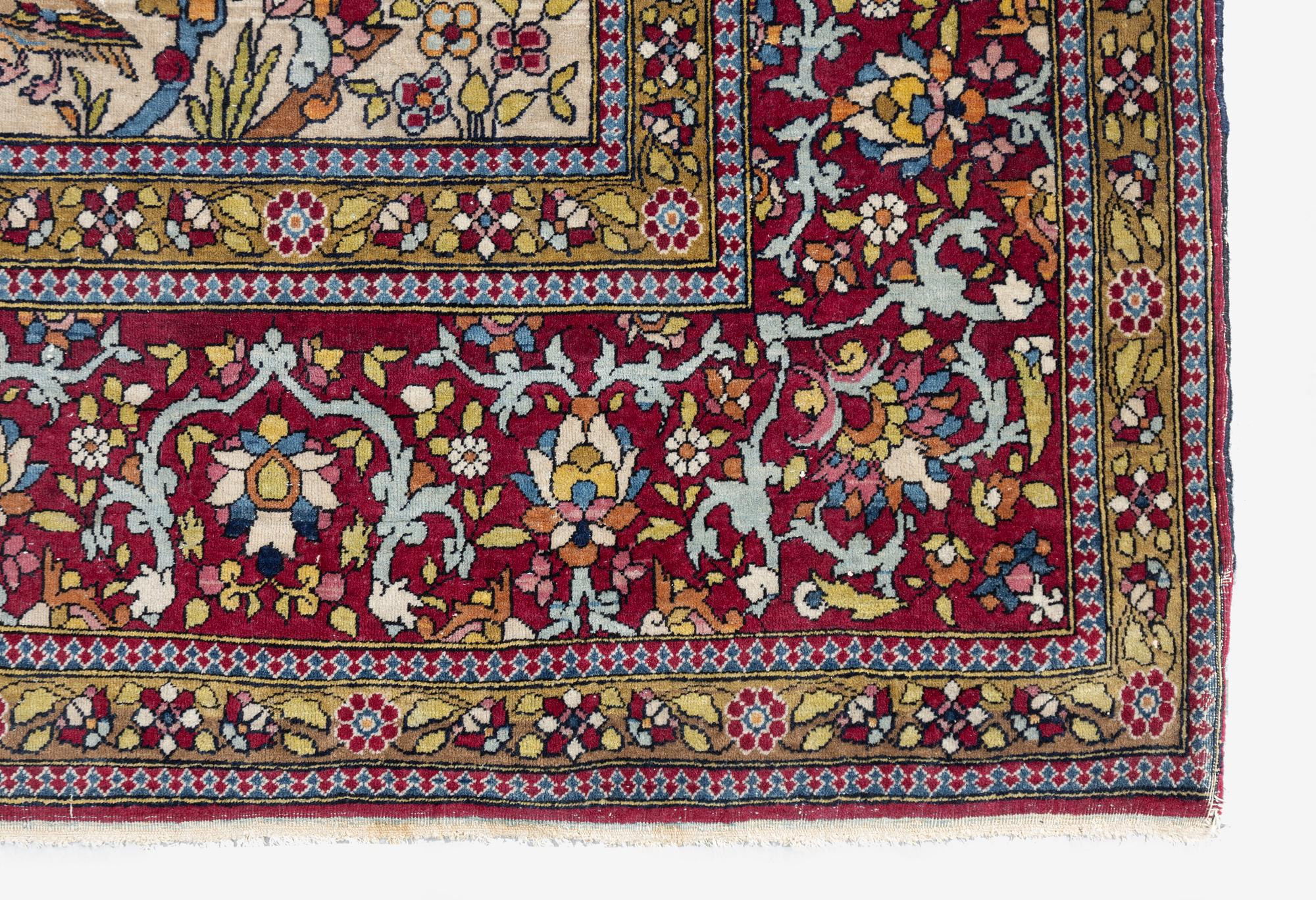 An antique Isfahan rug, Central Persia, c. 219 x 143 cm.