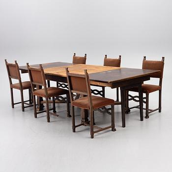 A Baroque-style dining table with six chairs, around 1900.