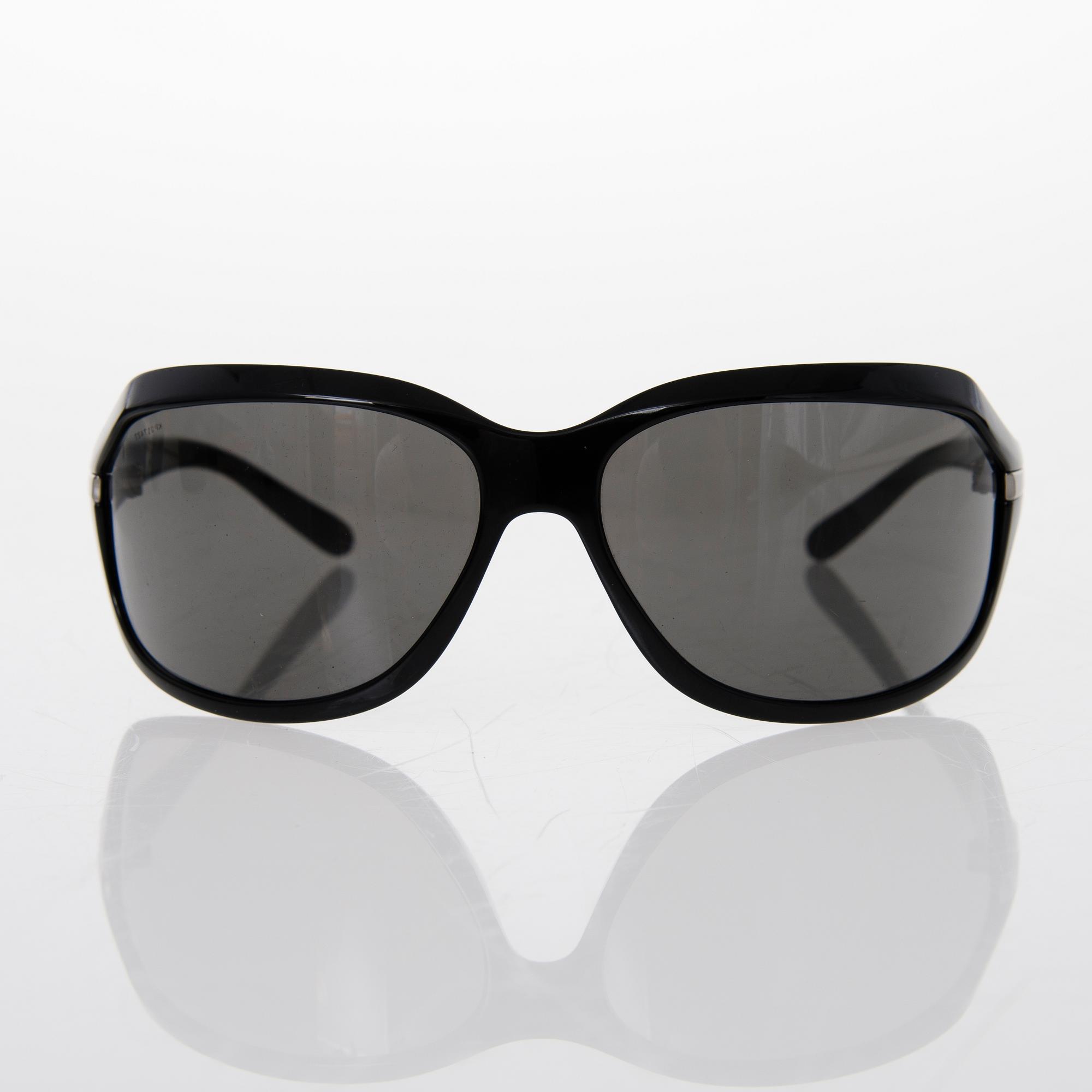 Prada and Chanel Sunglasses.