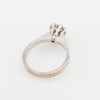 Ring 18K vitguld med en gammalslipad diamant.