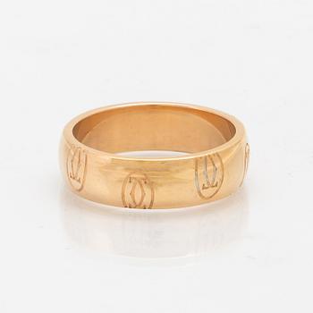 An 18K gold ring "Logo de Cartier" by Cartier.
