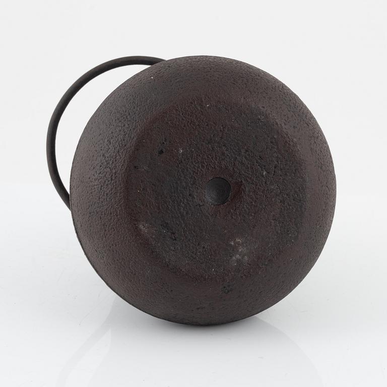 A Japanese iron vessel with cover, Meiji period (1868-1912).