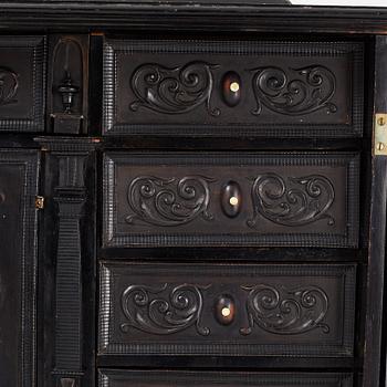 A South-German Baroque ebonized collector's cabinet on stand, circa 1700.