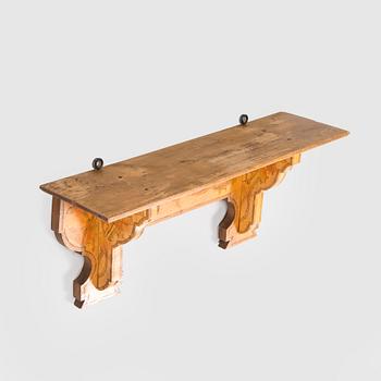 Wall-mounted shelf, early 20th century.