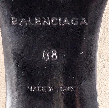 A pair of Balenciaga beige suede shoes size 38.