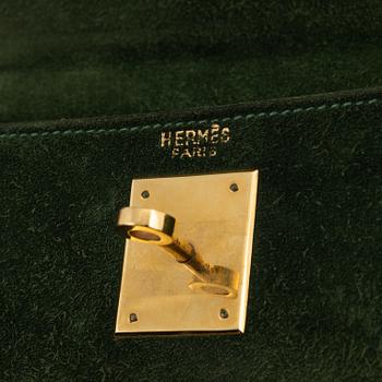 Hermès, a 1960's green suede 'Kelly 30'.