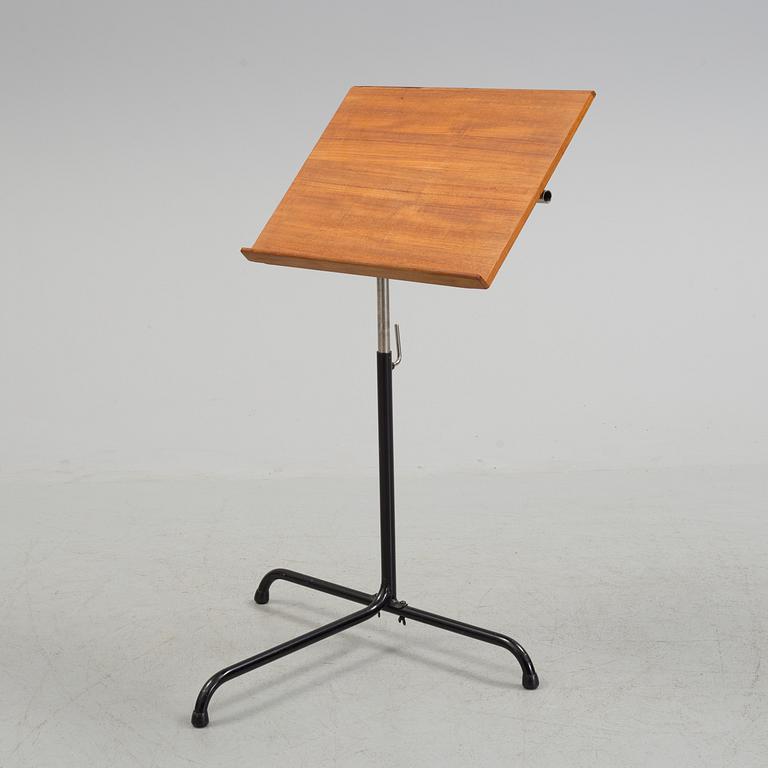 A 1950s teak reading / writing stand.