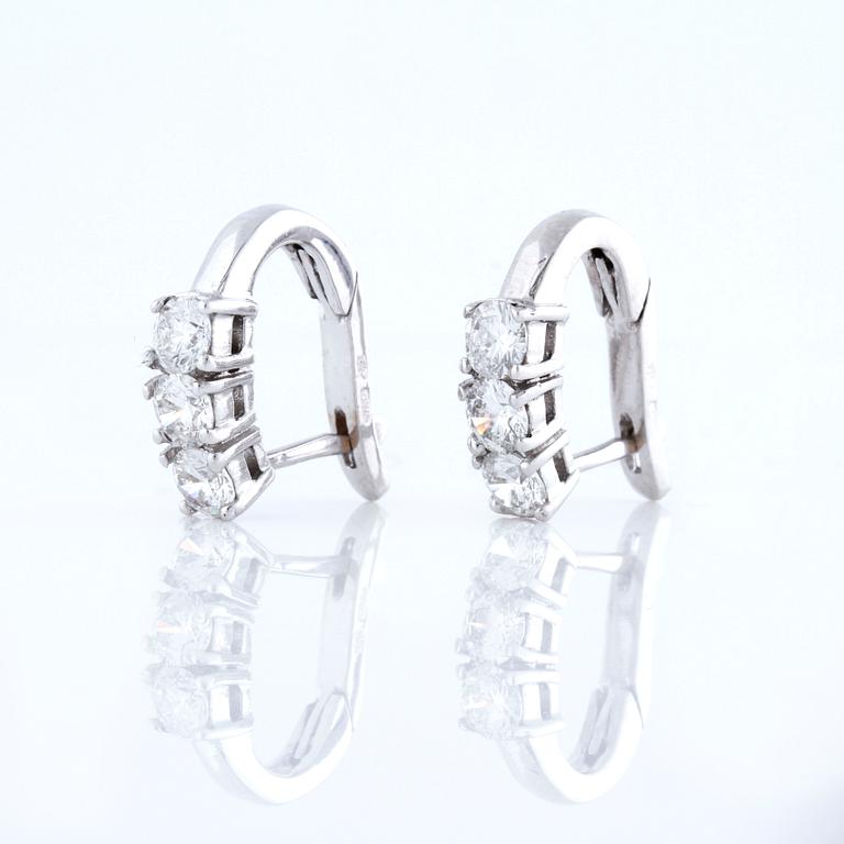 A pair of ca 1.00 cts brilliant-cut diamond earrings, from Milano, Italy.