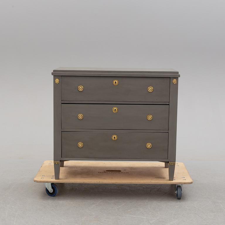 A circa 1900 chest of three drawers.